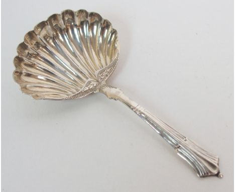 A SILVER CADDY SPOON by John Thropp, Birmingham 1815 with shell shaped bowl, 8cm long Condition Report: Available upon reques