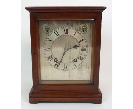 A VICTORIAN MAHOGANY MANTLE CLOCK with silvered dial, the chapter ring with Roman numerals and with two subsidiary dials, 26c