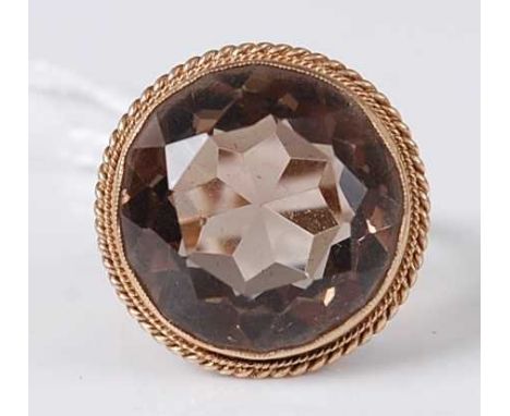 A modern 9ct gold smoky quartz set dress ring, 7.4g, size N/O