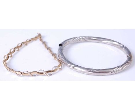 A 9ct carat yellow and white gold gatelink bracelet 5.3g, together with a white metal hinge bangle (2)