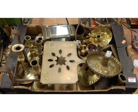A box of miscellaneous metalware to include brass cased lantern, chamber sticks, candle sticks,  trivet etc