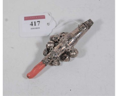 A 19th century silver baby's rattle, having whistle to one end and coral teether to the other, suspended with various bells, 