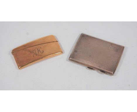 An early 20th century 18ct rolled gold cased visiting card case, of hinged oval form; together with a George V silver engine 