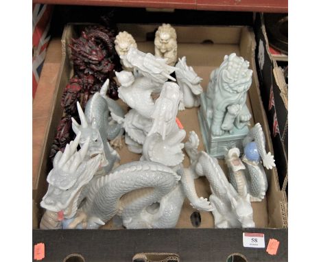 A John Jenkins Fine Porcelain model of a Chinese dragon; together with various other ceramic and resin dragon figures (one bo