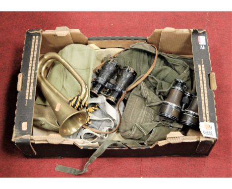 A box of miscellaneous items, to include brass bugle, WWI private purchase binoculars, canvas webbing etc 