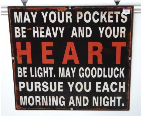 A reproduction enamel sign bearing Good Luck verse