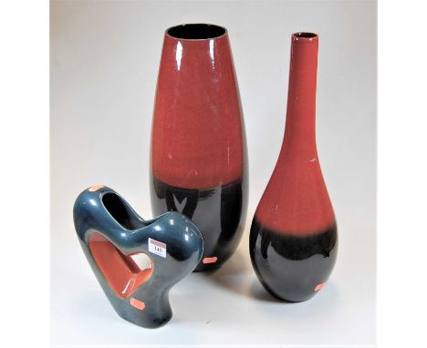 A John Rocha ceramic vase, of ovoid form, glazed in red and black, h.43cm; together with one other similar bottle vase; and a