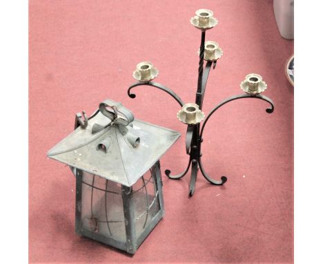 An early 20th century hall light fitting; together with a wrought iron four sconce candelabra; and a stoneware barrel (3)