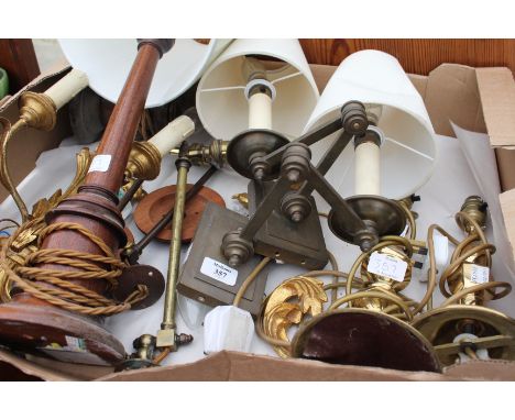A COLLECTION OF LIGHTING to include two folding brass wall lights, a giltwood twin branch wall light, a pair of turned wooden