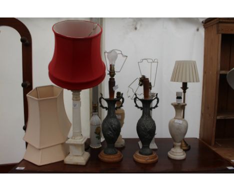 A PAIR OF SPELTER TABLE LAMPS together with an alabaster table lamp of column form and further table lamps (9)