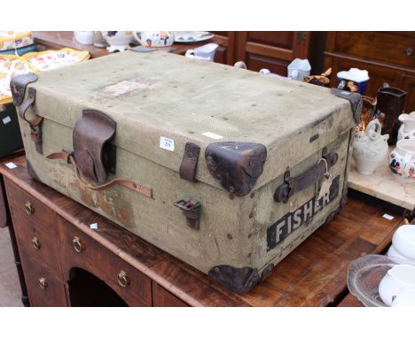 A VINTAGE CANVAS AND LEATHER BOUND TRAVELLING TRUNK 77cm wide x 48cm deep x 32cm high