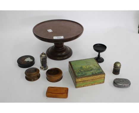 A 20TH CENTURY OAK TURNED TAZZA a selection of treen boxes, silver plated pepperettes, an ebonised and lacquered trinket box,