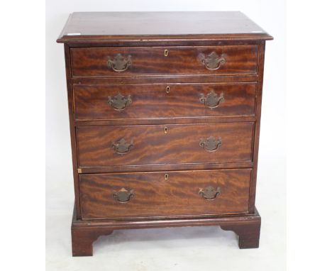 A GEORGIAN STYLE MAHOGANY CHEST of four long drawers standing on bracket feet 65cm wide x 42cm deep x 77cm high 
