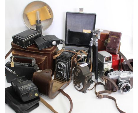 A SELECTION OF VINTAGE CINE CAMERAS  and accessories to include additional lenses and flash, models to include a Bell & Howel