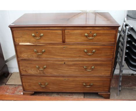 A GEORGE III MAHOGANY STRAIGHT FRONT CHEST of two short and three long drawers with brass swan neck handles on bracket feet, 