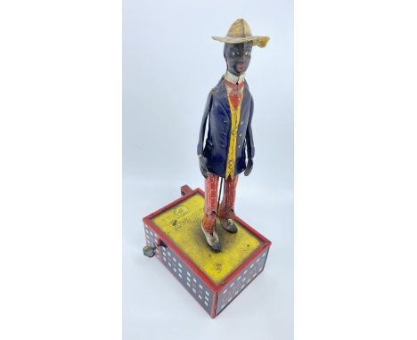 Lehmann c1912 German, Oh My,&nbsp; Alabama Jigger tinplate clockwork toy. Tinplate construction, lithograph decoration, clock