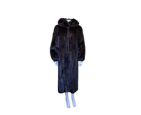 A 1970s full length mink coat with hood and leather braid and mink tail tassel ties 40 inch/ 102 cm bust (s-m)(1)clean, gloss