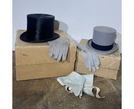 A black silk top hat, a grey felt top hat, two pairs of kid suede gloves in grey and a pair of spats. (5)hats are in good con