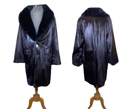 A 60s/70s men's fur coat, silk lined seal from the Siberian fur store, Hong kong. The coat has patch pockets with flaps, and 