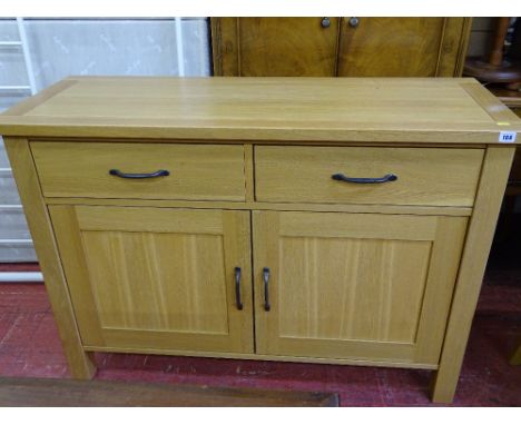 Modern light oak sideboard with two drawers and two cupboards
