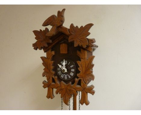 Cuckoo clock with weights