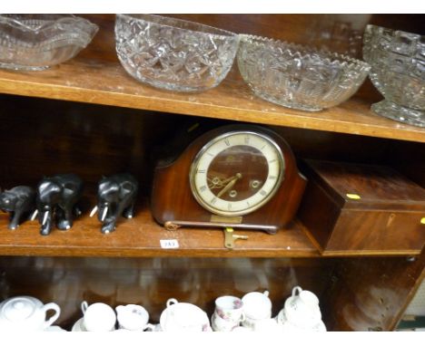 Polished mantel clock, ebony elephants, stationery box