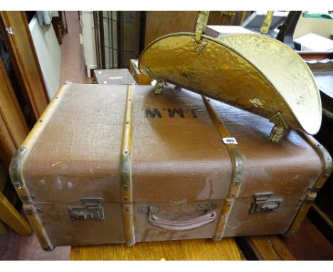 Banded hard canvas trunk initialled 'J M W' and a beaten brass swing handled log carrier