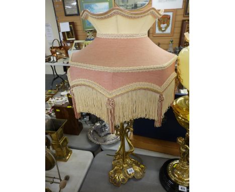 Converted elaborately decorated brass table lamp with shade