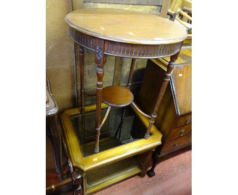 Circular mahogany occasional table with base shelf and reeded and turned supports and a reproduction near square glass topped