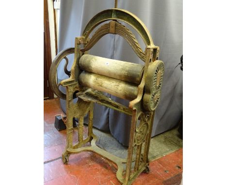 Vintage mangle (with a Phoenix/Griffin trademark in casting)