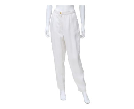 A white linen Chanel Boutique trousers. With a gold-coloured button at the top with the image of a sun.Fabric:100% linenSize: