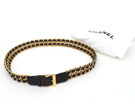 A black leather Chanel belt with twisted links. Chanel black interlaced lambskin &amp; gold vintage  double row chain belt. C