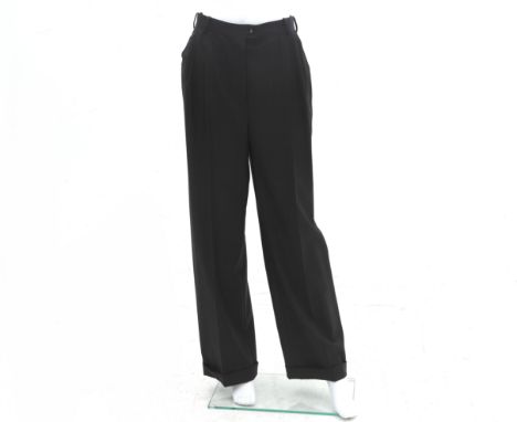 Dark gray Chanel pinstripe trousers. The waist button is black with a gold CC logo.Fabric:100% woolSize: 42 FR/ M, L EU (chec