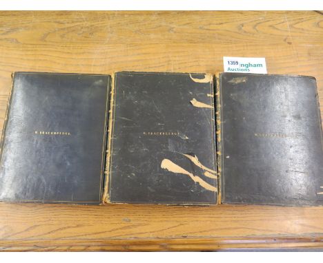 Three leather bound volumes of "The Holy Bible according to the authorized version" printed by Bensley, Cooke and Collinwood 