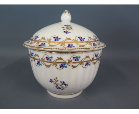 An early Derby sucrier with lid decorated in foliate gilt design with floral sprays 