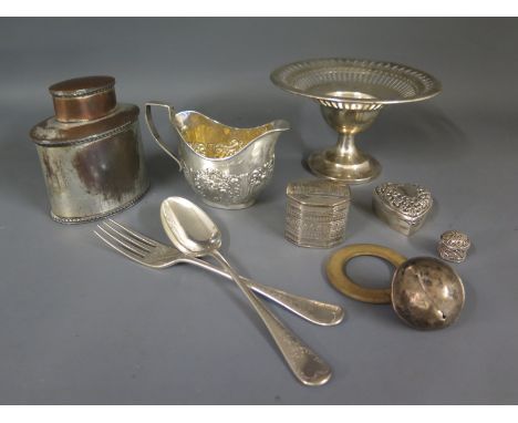 An Indian silver pill box, a silver hallmarked heart shaped pill box with Indian silver tape measure, silver plated tea caddy