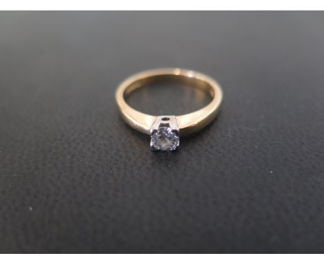 An 18ct gold brilliant-cut diamond single-stone ring - Diamond weight 0.25ct, stamped to band - Hallmarked London - Ring size