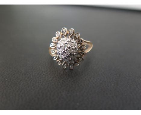 A 9ct gold diamond floral cluster ring - Hallmarked London - Ring size P 1/2 - Weight approx 3.2gms
Condition Report: Good - 