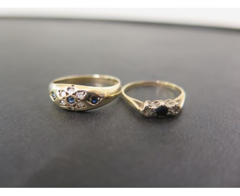 Two 9ct gold sapphire and diamond rings - To include a three-stone, together with an inset band ring - Hallmarked Birmingham 