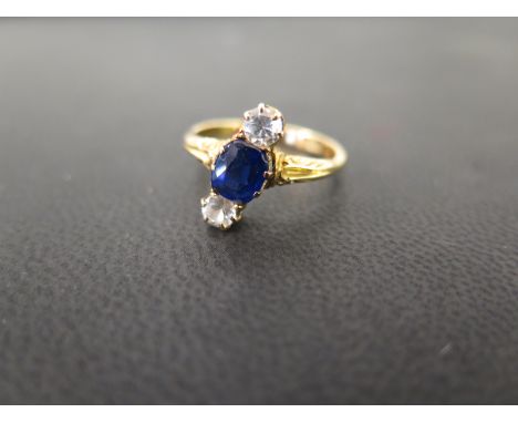 An early to mid 20th century synthetic sapphire and zircon three-stone crossover ring - Size N - Weight approx 3.7gms
Conditi