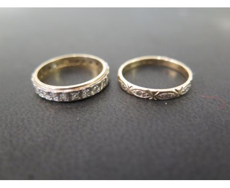 Two 9ct gold diamond full-circle rings - Hallmarked Birmingham and Sheffield - Ring size O - Weight approx 4.4gms
Condition R