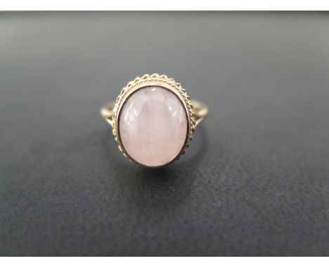 A 9ct gold rose quartz single-stone ring - Hallmarked London - Ring size O - Weight approx 3.2gms
Condition Report: Good to f