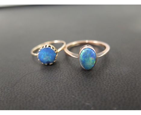 Two opal doublet single-stone rings - To include one stamped 9ct - Ring size S  - Together with one stamped 9ct & sil - Ring 