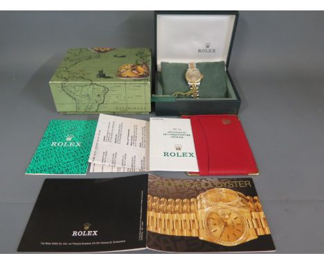 A Rolex Oyster Perpetual Datejust ladies automatic bi-metallic wristwatch model 69173 having 22mm tapestry dial with applied 