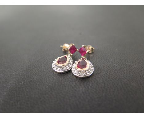 A pair of 9ct gold ruby and white-gem cluster ear pendants - Hallmarked Birmingham - Length 2cms - Weight approx 3.4gms
Condi