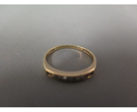 A 9ct gold brilliant-cut diamond half-circle ring - Hallmarked London - Ring size P - Weight approx 1.6gms
Condition Report: 