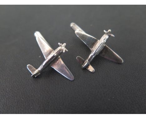 A pair of novelty cufflinks - Each in the form of an aeroplane to the to the swivel-back fitting - Stamped 925 - Weight appro