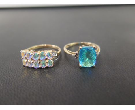 Two 9ct gold mystic-gem and diamond dress rings - Hallmarks obscured - Ring size P 1/2 - Weight approx 3.8gms
Condition Repor