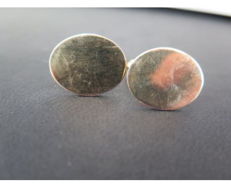 A pair of 9ct gold oval cufflinks - Hallmarked London - Weight approx 8.4gms
Condition Report: Good - With some light scratch
