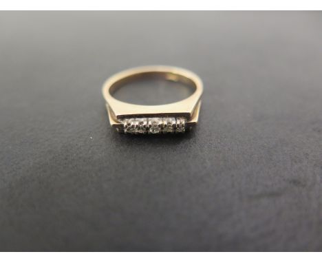 A diamond dress ring - The single-cut diamond line to the angular shoulders and textured band - Stamped 14K - Ring size O - W